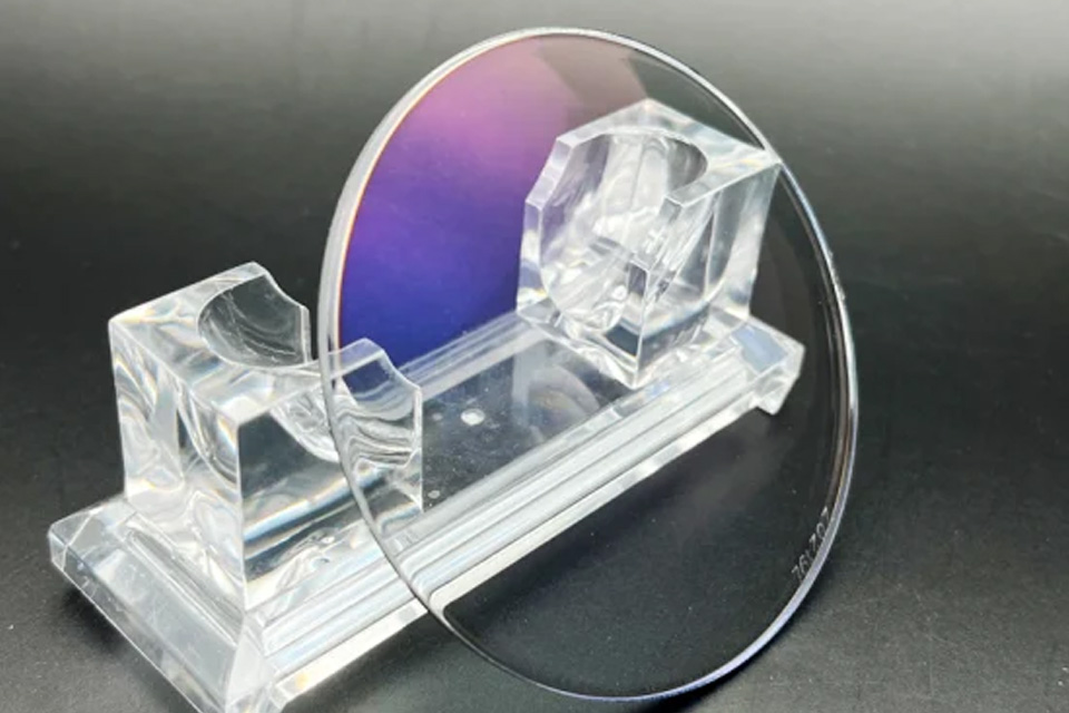Clear machined polycarbonate instrument fixture with transparent support features