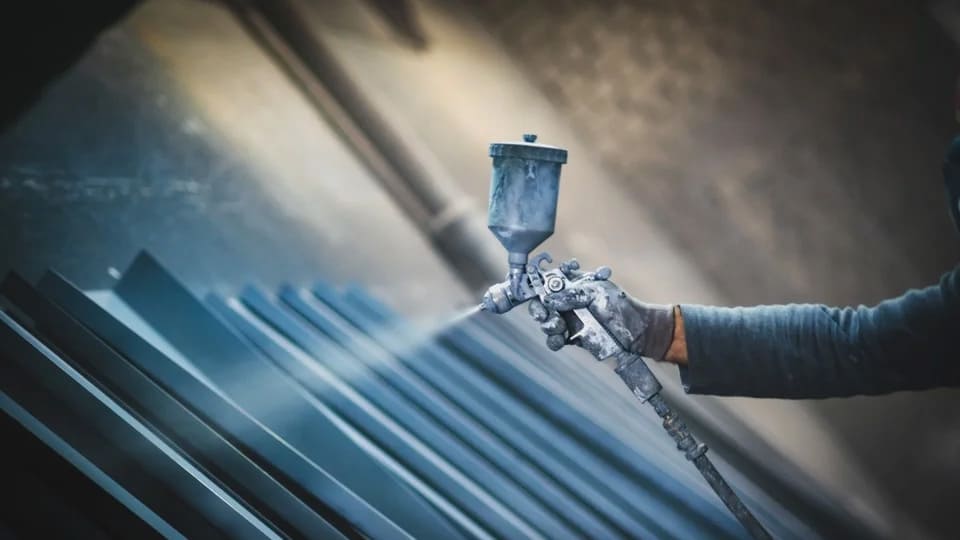 Surface coating applied to manufactured metal components