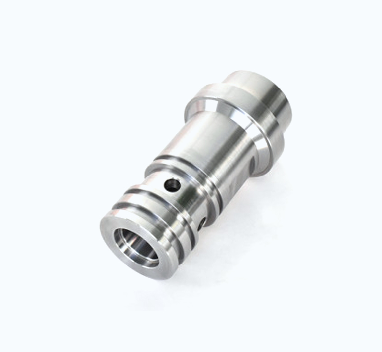 Cylindrical valve sleeve with grooves and cross-drilled ports
