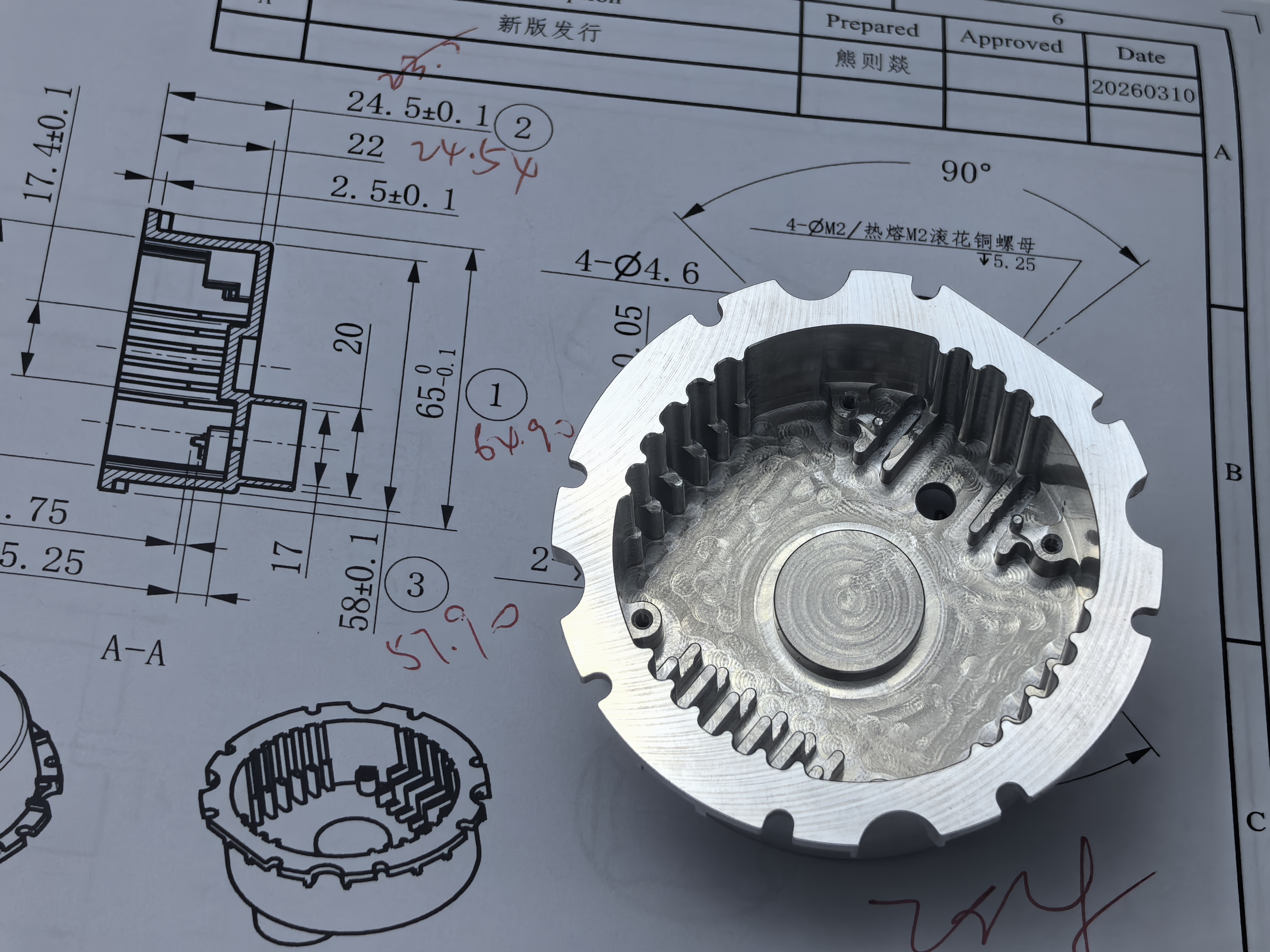 Machined metal component on an annotated engineering drawing during quality review